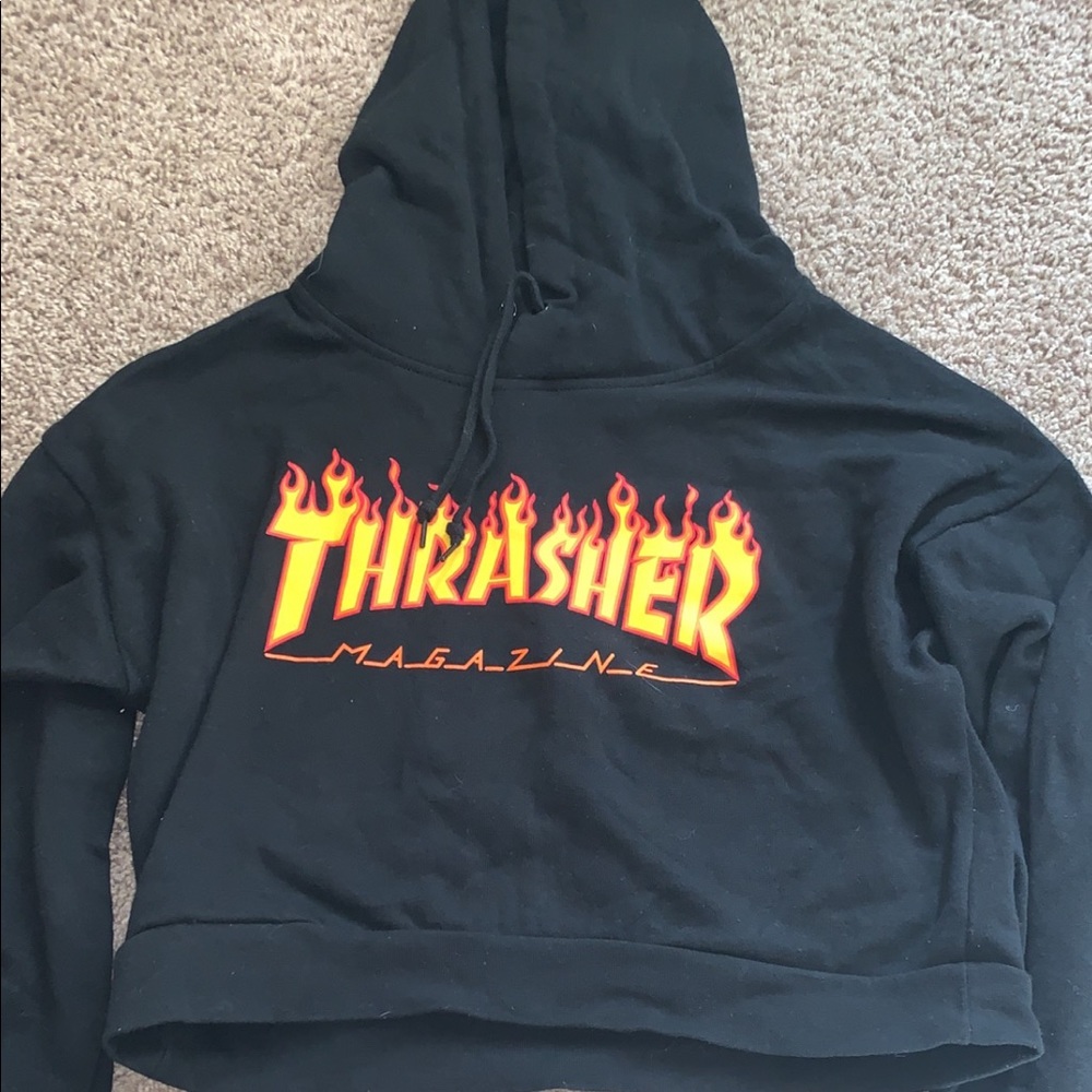 Black Thrasher crop top hoodie.
